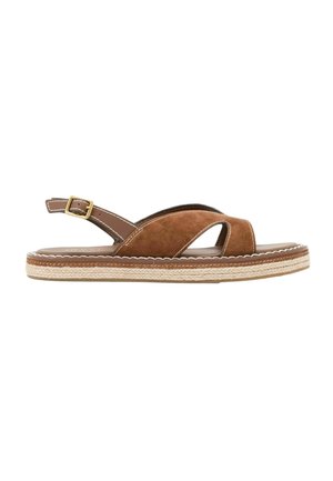 Brun ruskindsflad sandal med krydsede stropper, justerbar ankelspænde og vævet såldetalje.