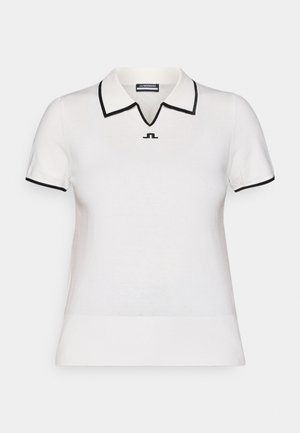 Kratkoročna bela polo majica s črnim obrobom, z obliko v-izreza in majhnim logotipom na prsih. Gladka tkanina s prilegajočo silhueto.
