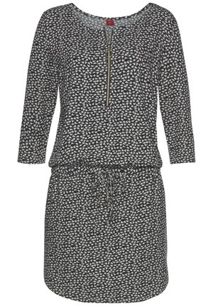 Robe midi à motifs noir et blanc, manches 3/4, fermeture éclair frontale avec tirette en anneau et taille à cordon de serrage.