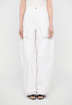 White cargo pants with a relaxed fit, featuring large side pockets, a button closure, and a smooth texture. Suitable for casual wear.