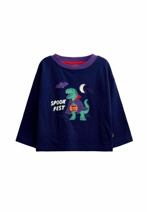 Mørkeblå langærmet skjorte med lilla krave, med en grøn dinosaur i en vampyrkappe, der holder en græskar og teksten "Spook Fest" med flagermus og en måne.