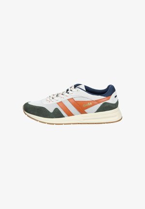 White mesh sneakers with green suede accents, orange stripes, and navy blue details; features a cushioned sole and textured laces.