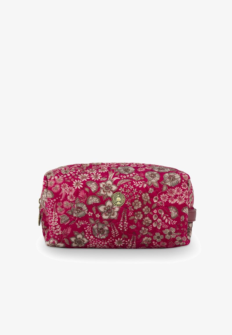 Floral-patterned cosmetic bag in pink and beige fabric, rectangular shape, with a gold logo accent and a zipper closure on the side.