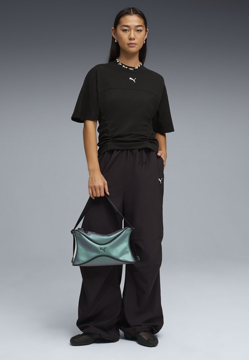Puma DARE TO FITTED WAIST TEE - Jednoduché tričko - black
