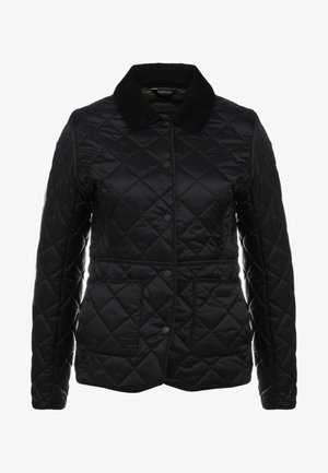 Casaco acolchoado preto com colarinho de veludo, fecho de botões de pressão e dois bolsos frontais. Textura suave com padrão de losangos por todo o lado.
