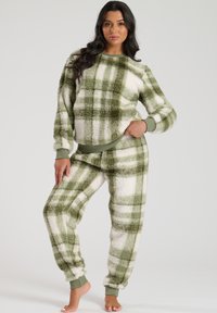 Miękkie, zielono-białe w kratę zestaw loungewear wykonany z materiału sherpa, z okrągłym dekoltem, elastycznymi mankietami i paskiem w talii.