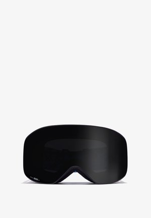 Zwarte skibril met een brede gebogen lens en schuimrubberen padding, met het label "Lens by Zeiss S3" in de onderste hoek.