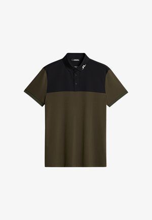 Polotröja med en svart överdel och en olivgrön underdel. Tillverkad av ett glatt tyg, med krage och tre knappar.