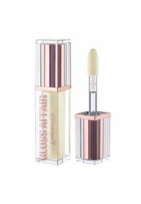 Gloss labbra trasparente in un tubo esagonale con corpo trasparente, accenti metallici rosa e un applicatore morbido. Contiene particelle brillanti.