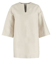 Tunique en lin beige avec un décolleté en V, des manches courtes et une coupe décontractée. Le tissu a une apparence texturée subtile.
