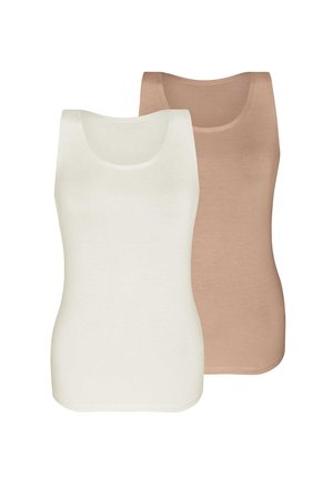 Woman with light brown hair wearing a white sleeveless tank top and matching white underwear standing against a plain background.