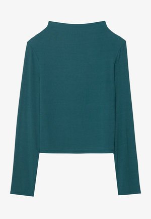Haut à manches longues côtel�é en bleu sarcelle profond. Présente un col haut et une longueur de taille. Le matériau semble texturé avec une finition douce.