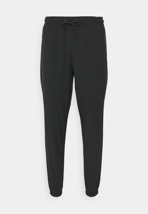 UTILITY TECH PANT - Spodnie materiałowe - black