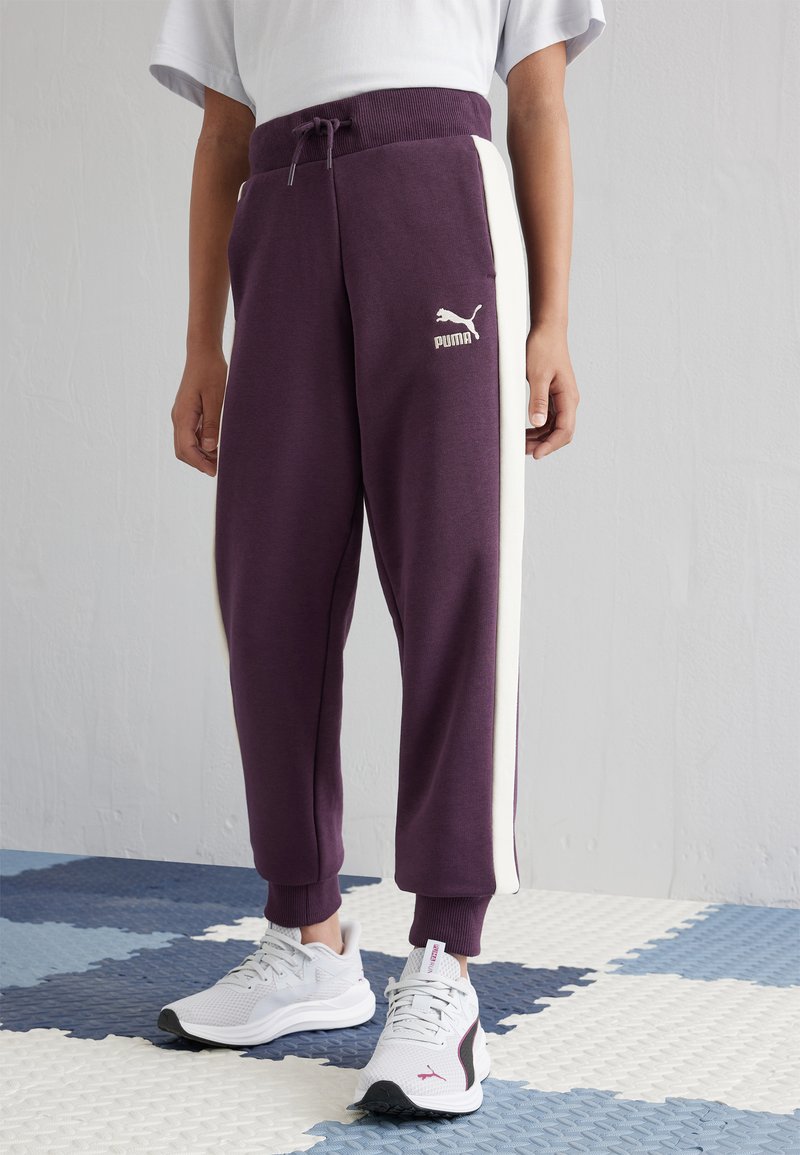 Puma CLASSICS TRACK PANTS UNISEX - Tracksuit bottoms - midnight plum ...