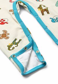 Cotton baby bodysuit in cream with colorful candy and animal prints, featuring a turquoise snap closure. Soft texture with a lined inner.