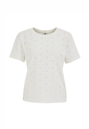 Blouse blanche à manches courtes avec col rond et motif floral en découpe ajourée sur tout le tissu.