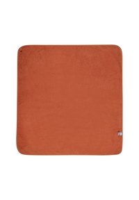 Terracotta blanket, soft texture, square shape, clean edges, and a small logo tag on one corner. Fabric appears plush and uniform.