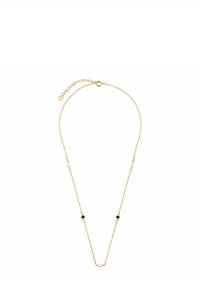 Złoty naszyjnik z delikatnym łańcuszkiem, w którym naprzemiennie występują czarne i białe okrągłe koraliki. Regulowana długość z zapięciem.