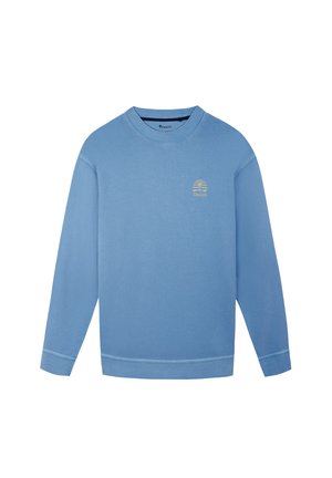 Light blue sweatshirt with long sleeves, round neck, featuring a small gold logo design on the chest. Soft cotton material, simple design.