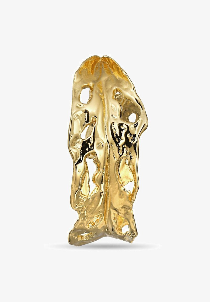 Złota abstrakcyjna rzeźba o teksturowanym, organicznym kształcie z nieregularnymi otworami i gładkimi powierzchniami, podkreślająca właściwości refleksyjne.