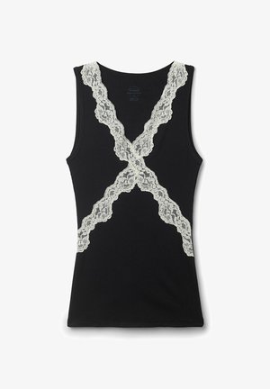 Débardeur sans manches noir avec un bord en dentelle blanche formant une forme de X sur le devant et autour du col.