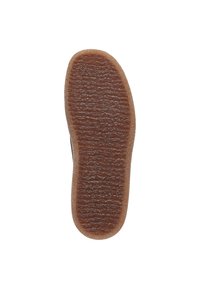 Semelle en caoutchouc marron avec une surface texturée, de forme ovale et de rainures prononcées pour une traction, conçue pour la stabilité des chaussures.