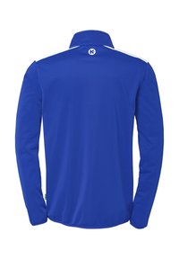 Langarm, geknoopte shirt van stevige blauwe stof met witte schouderaccenten. Beschikt over een logo op de achterkant, een gladde textuur en een sportief ontwerp.