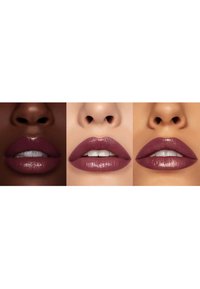 Three pairs of lips displaying various shades of mauve lipstick on different skin tones. The left features a glossy finish, while the center and right are matte.