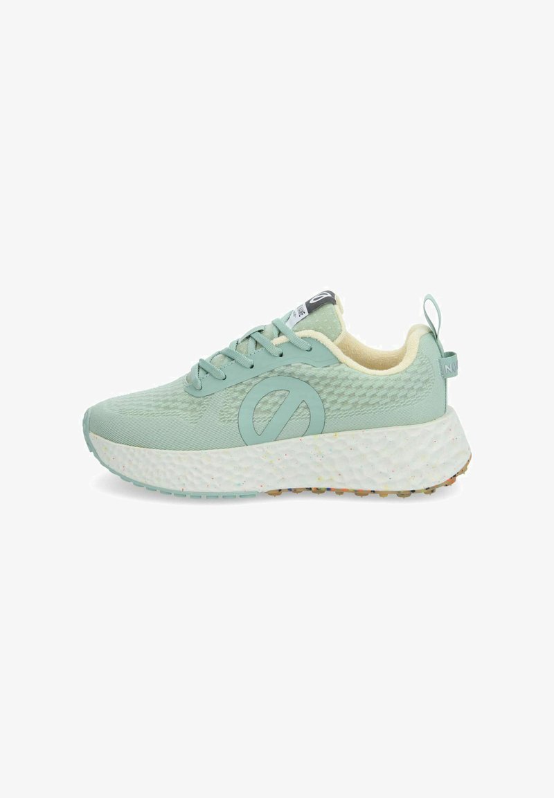 Light green athletic shoe with textured upper, round laces, and a prominent logo on the side. Thick white sole with multicolored speckles.