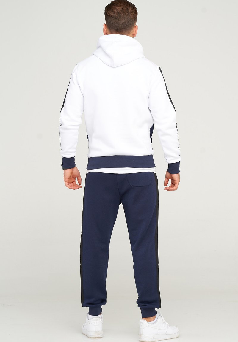 Herren Trainingsanzüge | Jack & Jones JCOHARRY Jogginghose navy blazer/dunkelblau - LC04410 Herren Trainingsanzüge | Jack & Jones JCOHARRY Jogginghose navy blazer/dunkelblau - LC04410