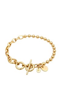 Guldtonad armband med en blandning av släta länkar och runda kulor, med en toggelkrok och en liten charm som accent.