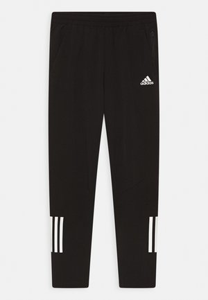 RUN PANT - Pantaloni sportivi - black/impact/yellow