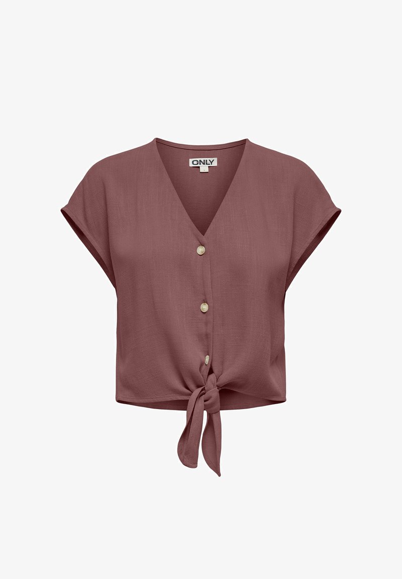 Blouse mauve à manches courtes avec col en V, trois boutons sur le devant et un nœud à la base.