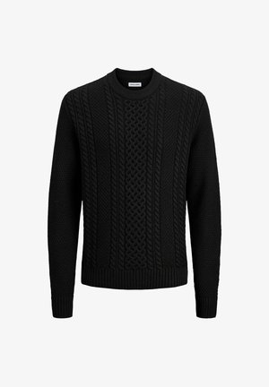 Sort strikket sweater med teksturerede mønstre, herunder kabel- og ribbede detaljer. Har en rund halsudskæring og lange ærmer.