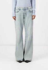 Light blue wide-leg jeans made from denim, featuring five pockets, a front button closure, and subtle fading along the fabric.