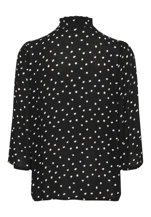 Blouse noire à pois blancs, avec un col haut, des manches trois-quarts et une coupe décontractée. Tissu léger et texturé.