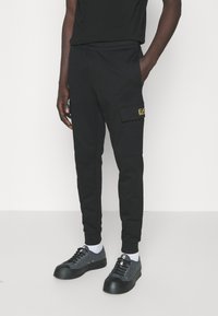 EA7 Emporio Armani - TROUSER - Treniņtērpa apakšdaļas - black Miniatūras attēls 1