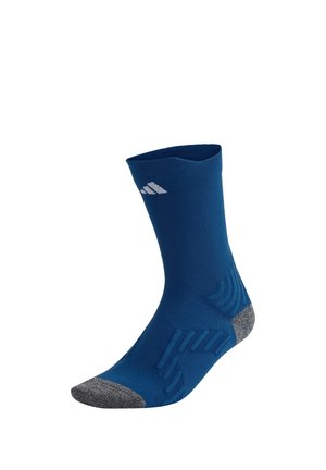 Blauer Sportsocken mit grauer verstärkter Spitze und Ferse, mit strukturierten Griffmustern und einem kleinen weißen Logo nahe der Oberseite.
