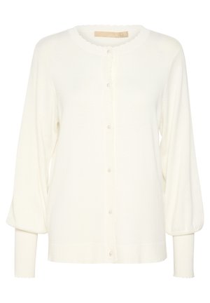 Cardigan crema in morbido tessuto a maglia. Presenta un collo rotondo con bordi scallop, chiusura con bottoni e maniche a palloncino con polsini a coste.