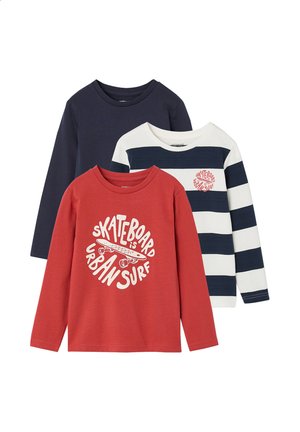 Three long-sleeve children's shirts in navy, white with navy stripes, and red with a skateboard graphic and "Skateboard is Urban Surf" text.