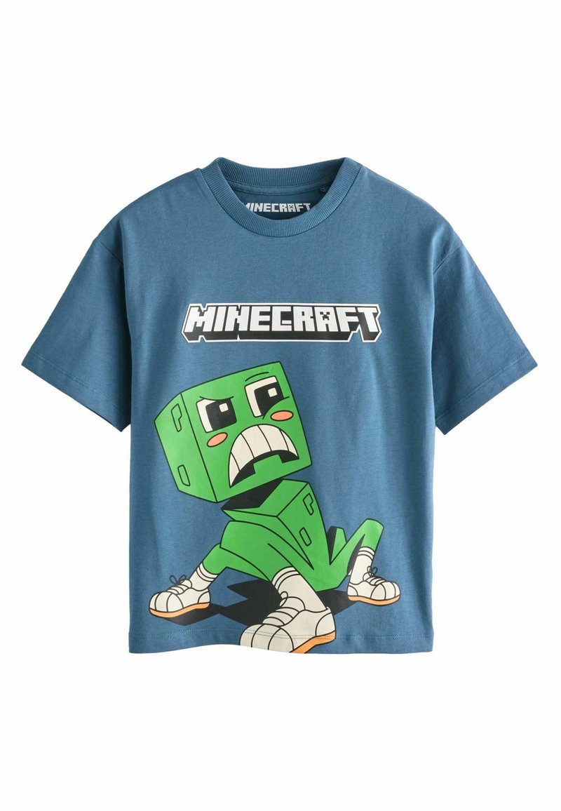 Sinine puuvillane T-särk, millel on roheline plokihaldjas koomiliselt naeratades, teksti "MINECRAFT" graafika kohal. Lühikesed varrukad, ümar kaelus.
