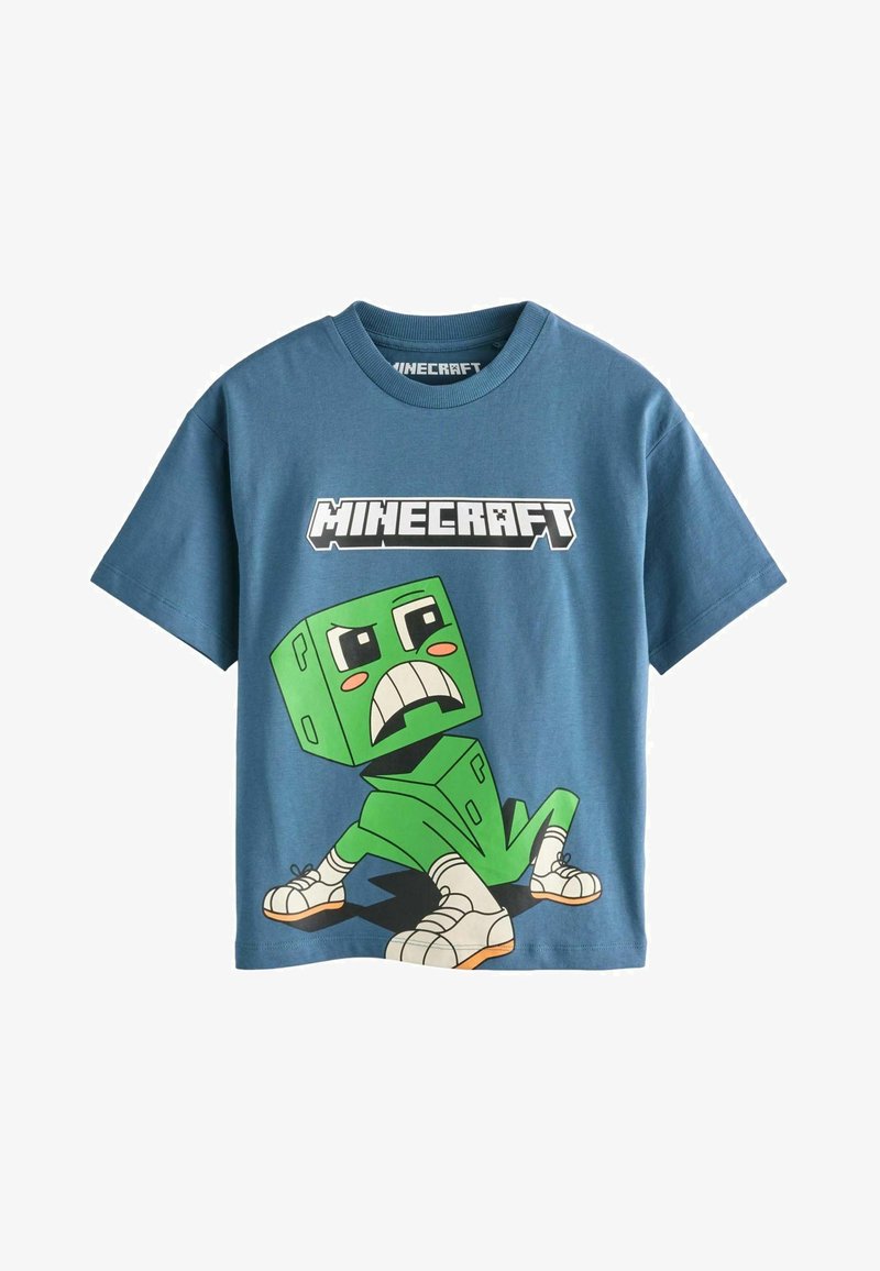 Modré bavlněné tričko s krátkým rukávem, na kterém je zelená bloková postava s karikaturním výrazem a nápis "MINECRAFT" nad grafikou. Kulatý výstřih.