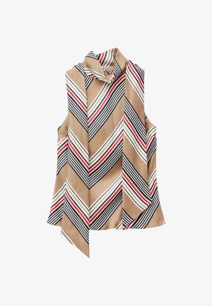 Top beige senza maniche con collo alto e strisce diagonali in nero, bianco e rosso, caratterizzato da un orlo asimmetrico.