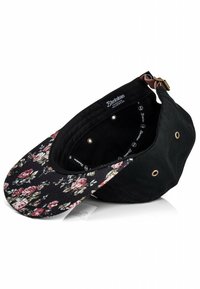 Black cap with a floral pattern on the brim. Features a curved shape, fabric material, and a brown leather strap with metal hardware.