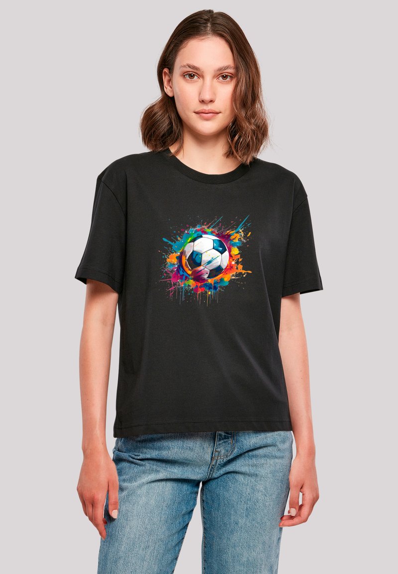 Black cotton t-shirt featuring a colorful graphic of a soccer ball surrounded by vibrant splashes of paint. Relaxed fit and short sleeves.