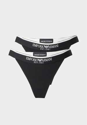To sorte Emporio Armani dame-tanga med hvide elastiske linninger og logo-tekst "Emporio Armani Est. 1981" foran.