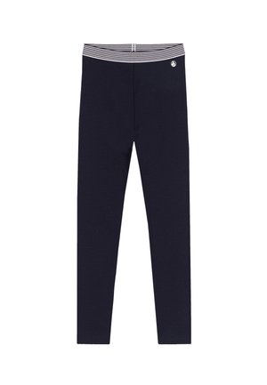 Tmavomodré legíny s elastickým pásom s bielymi a námorníckymi pruhmi a malým bielym logom plachetnice na ľavom boku.