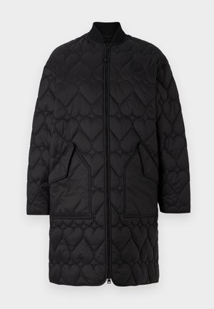 Black quilted coat with heart-shaped patterns, zip front, ribbed collar, and two angled pockets. Smooth finish with stitched detailing.