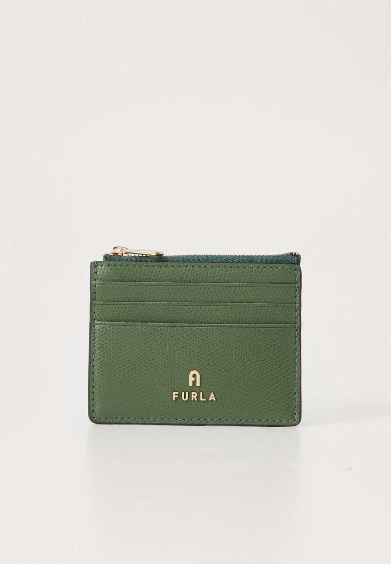 Green leather cardholder with gold hardware, featuring four card slots and a zippered compartment. Textured surface with subtle branding.