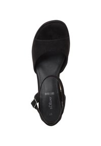 Black suede sandal with an open toe design, adjustable ankle strap, and padded footbed labeled "soft foam." Classic, minimalist shape.